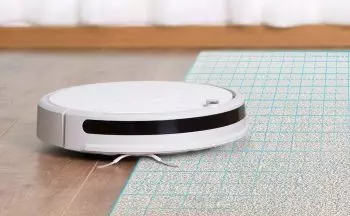 robot aspirador xiaomi en cambio de suelo a alfombra